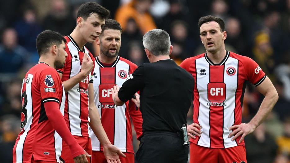 Sheffield United team-mates Jack Robinson and Vinicius Souza