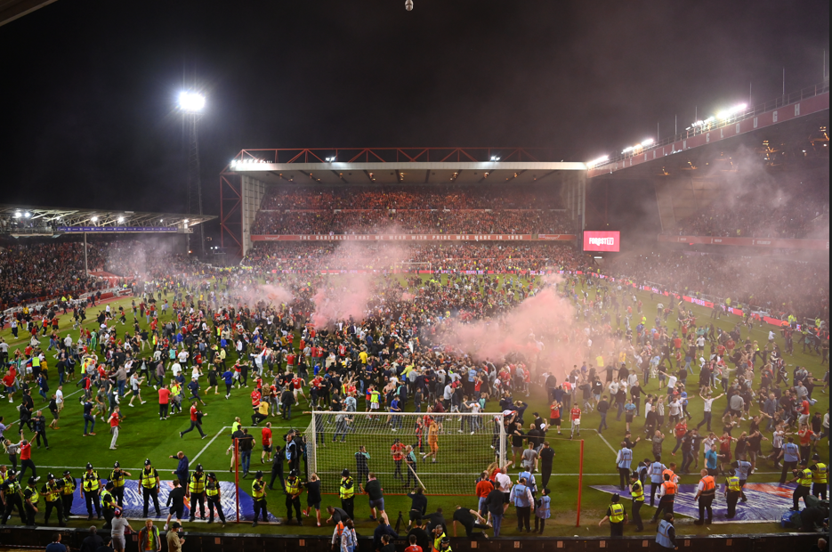 Fans invade the pitch after Nottingham Forest defeat Sheffield United on penalties in the play-off semi-final in 2022