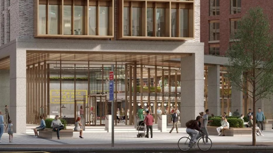 An artist's impression of the student accommodation building with students sitting outside and showing pedestrians walking by and cyclists passing