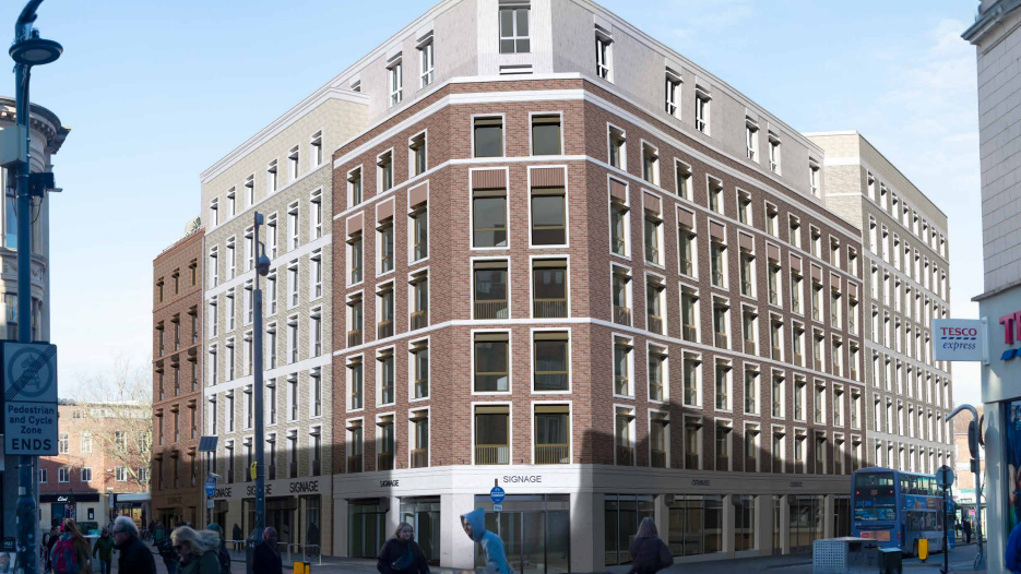 A computer-aided-design image of the building on how it would look after being redeveloped. It's now 8 storeys tall, primarily brown with parts of the building cream/off-white