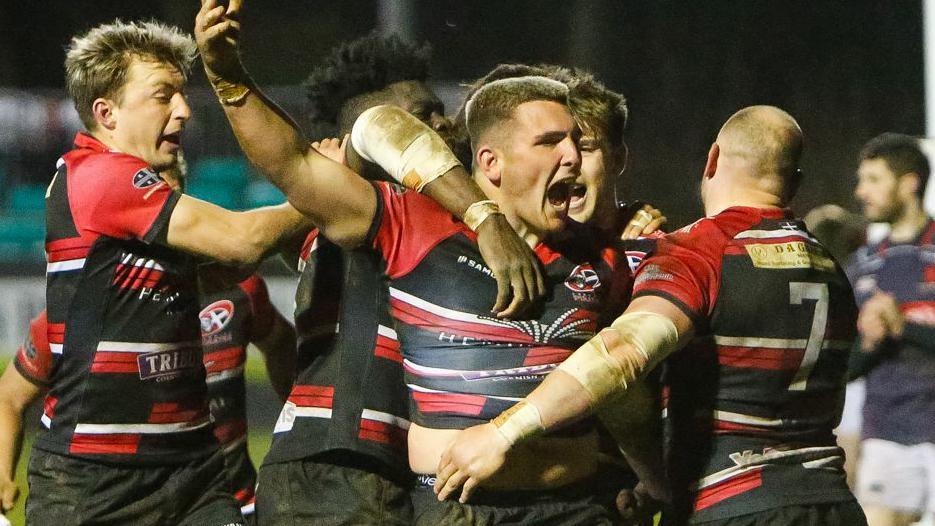 Cornish Pirates players celebrate a try