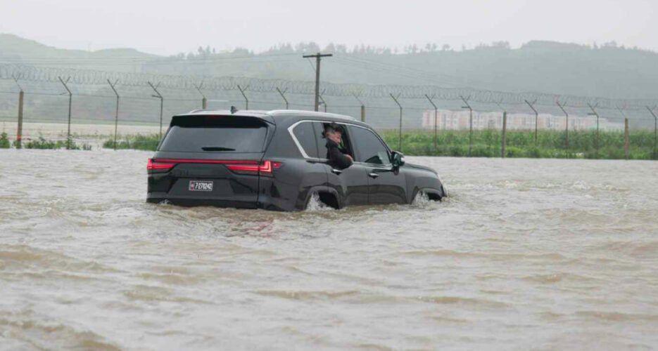 Kim Jong Un in floodwaters.