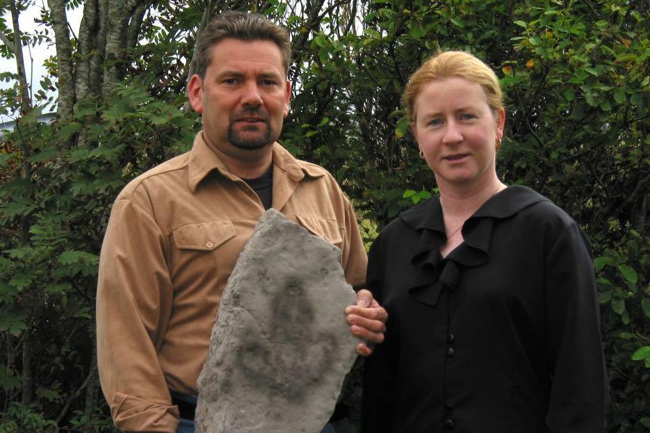 Paul and Cathie with a footprint they found