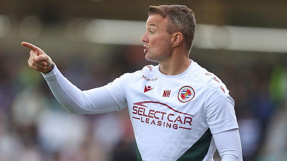 Reading manager Noel Hunt delivers instructions to his players