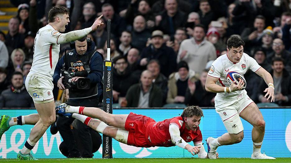 Henry Arundell runs clear to score a try for England
