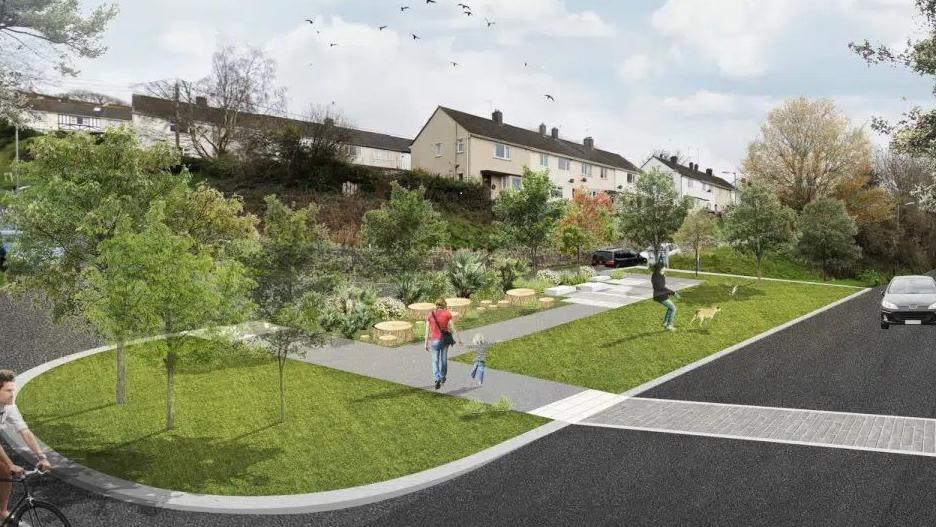 Artist's impression of plans with housing, roadway and green spaces.