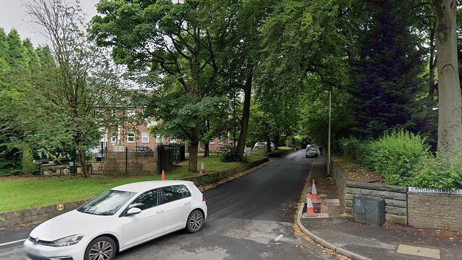 White vehicle travelling on Park Lane, Broughton, Salford 