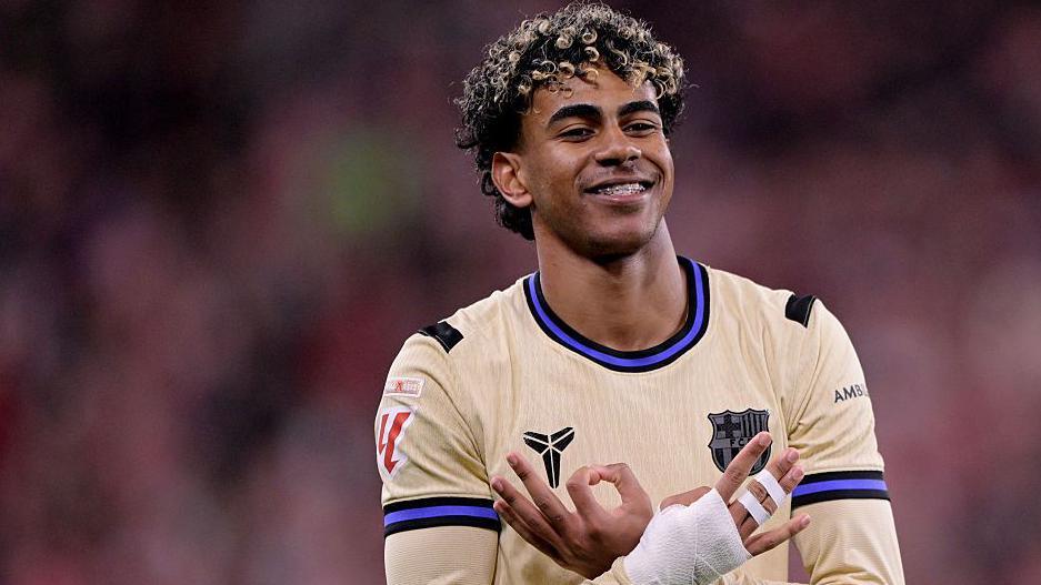 Lamine Yamal celebrates