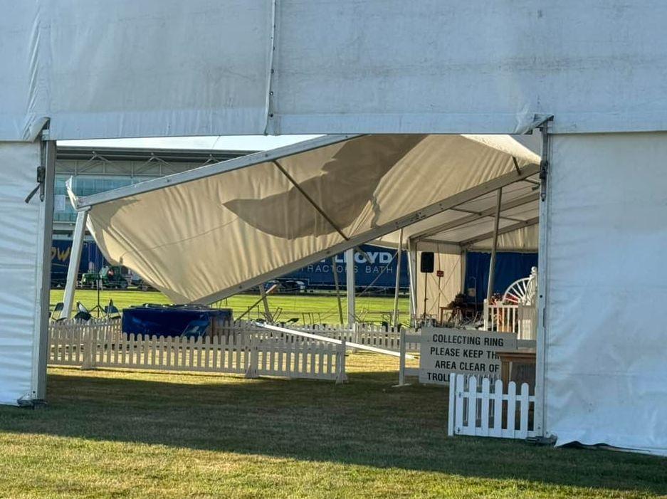 The frames and tent of a marquee fallen down due to Storm Lilian winds