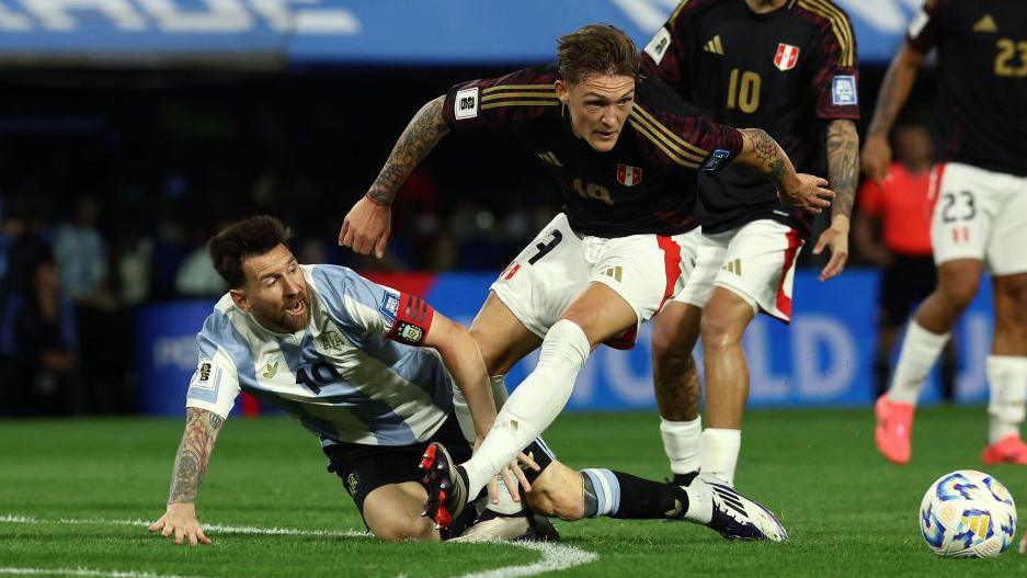 Oliver Sonne tackles Argentina's Lionel Messi during a World Cup qualifier in November, 2024