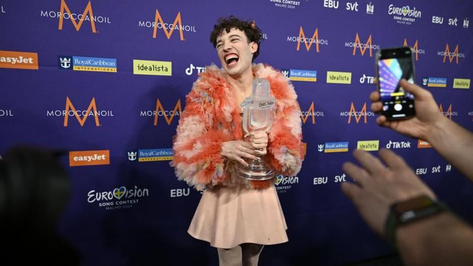 Nemo celebrates backstage at the Eurovision Song Contest