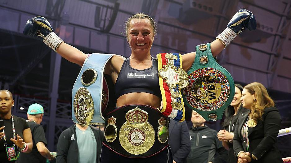 Ellie Scotney with the super-bantamweight titles