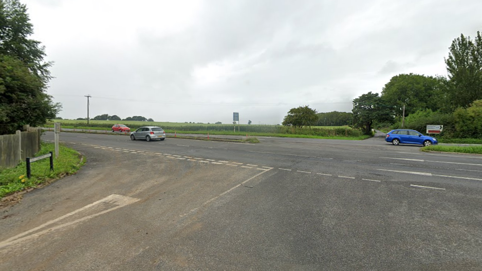 A Google Maps image of the junction off the A30, which shows two lanes on either side of the dual carriageway and two roads off it.