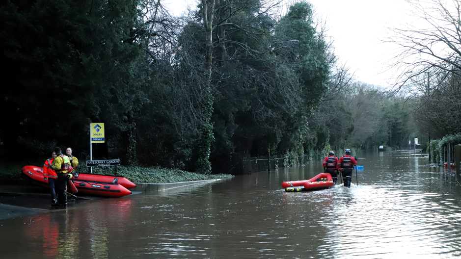 Boats used in rescuing people from flooded Didsbury