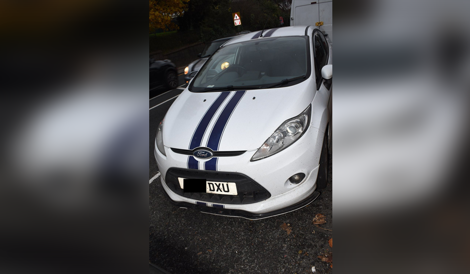 car with blue stripes