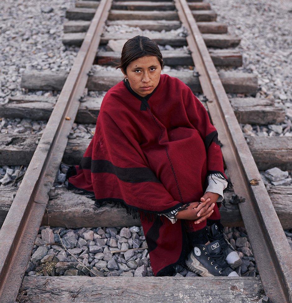 Portrait of Noelia Judith Kayo, 16 years old, at the roadblock in Purmamarca, province of Jujuy, Argentina, where native communities have been demonstrating for almost two months in defence of water and their land rights and against the constitutional reform promoted by Governor Morales on July 2, 2023. Noelia is the granddaughter of Narciso López, member of the First Malón de La Paz, where members of more than 400 indigenous communities walked from Jujuy to Buenos Aires to claim their lands to the then president Juan Domingo Perón, in 1946.