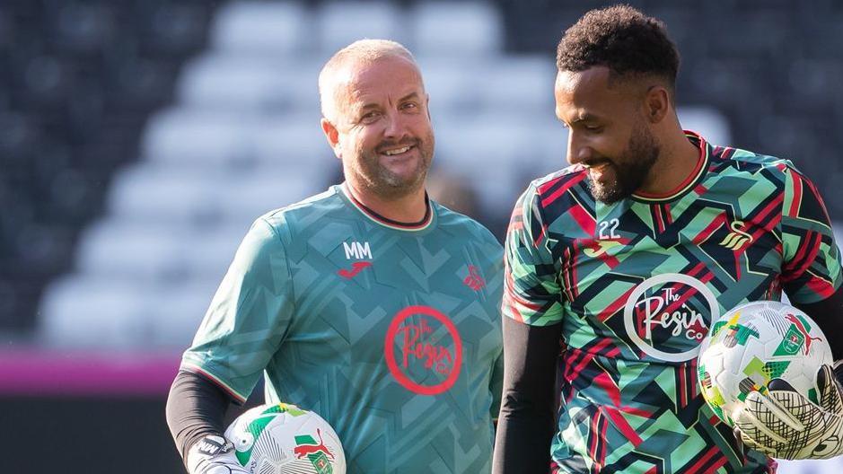 Martyn Margetson (left) with Swansea City goalkeeper Lawrence Vigouroux