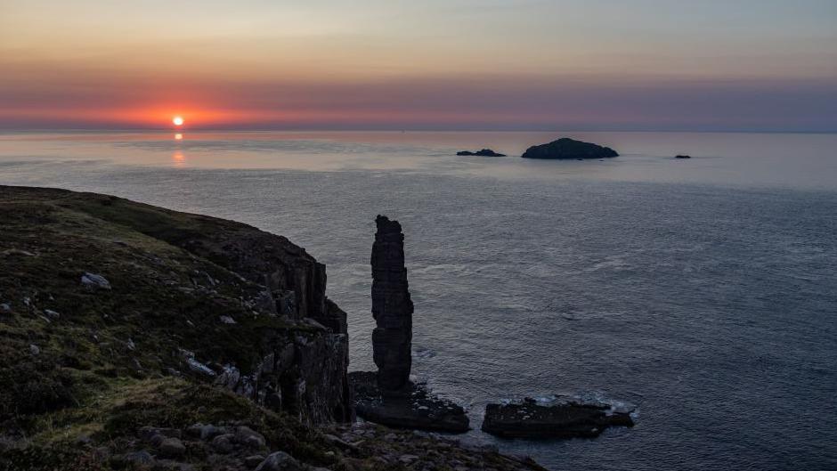 Sea stack Am Buachaille at sunset