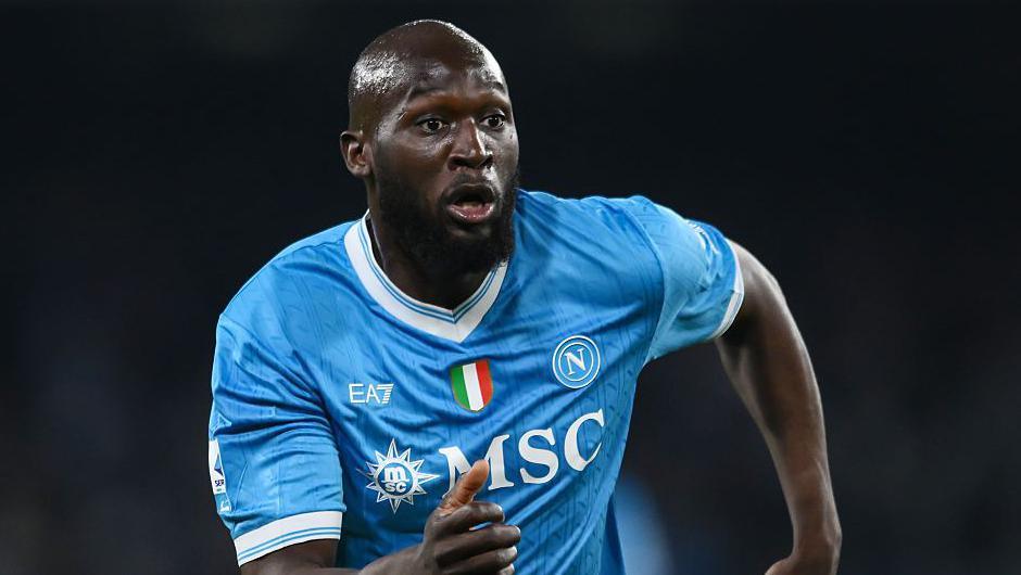 Romelu Lukaku running in a light blue Napoli shirt