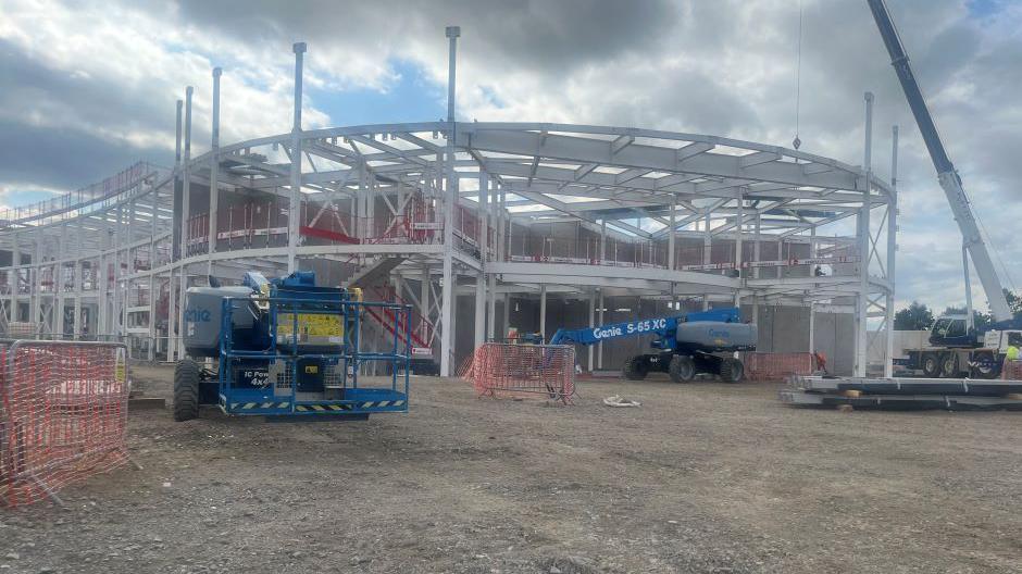 Steelwork at cranes at the site of HMP Highland