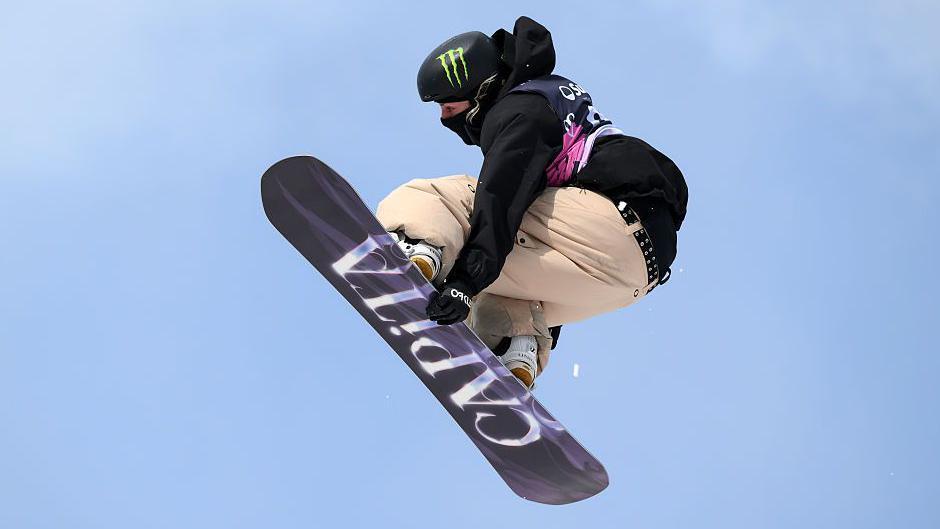 Mia Brookes performs an aerial move