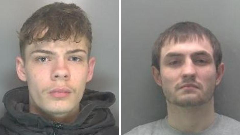 A close-up image of Tyler Marshall and Cameron Stokes who are in police custody. They both have short brown hair and are staring at the camera. Marshall is wearing a dark grey hoodie and Stokes a grey T-shirt.