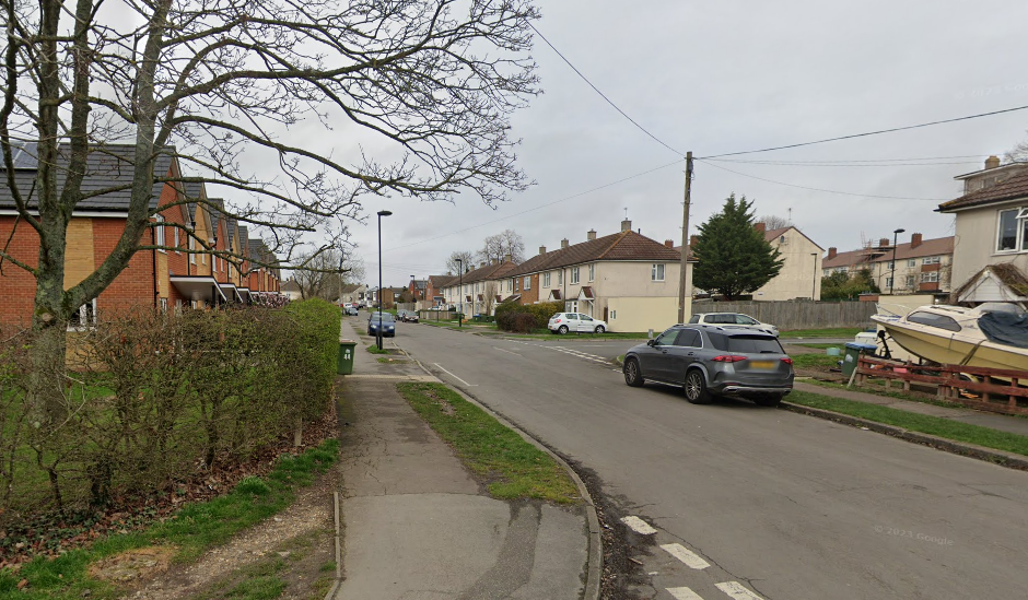 A Google Maps picture of Sullivan Road, a residential street with two-storey houses on either side 