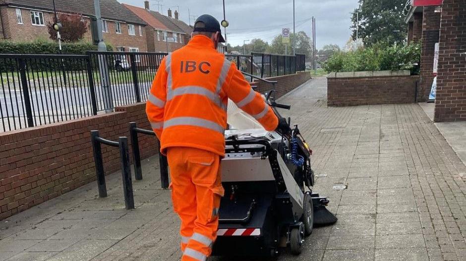 An Ipswich Borough Council worker cleaning the streets