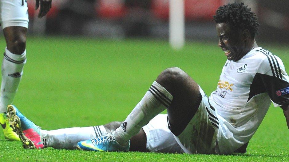 Wilfried Bony grimaces after injuring his hamstring