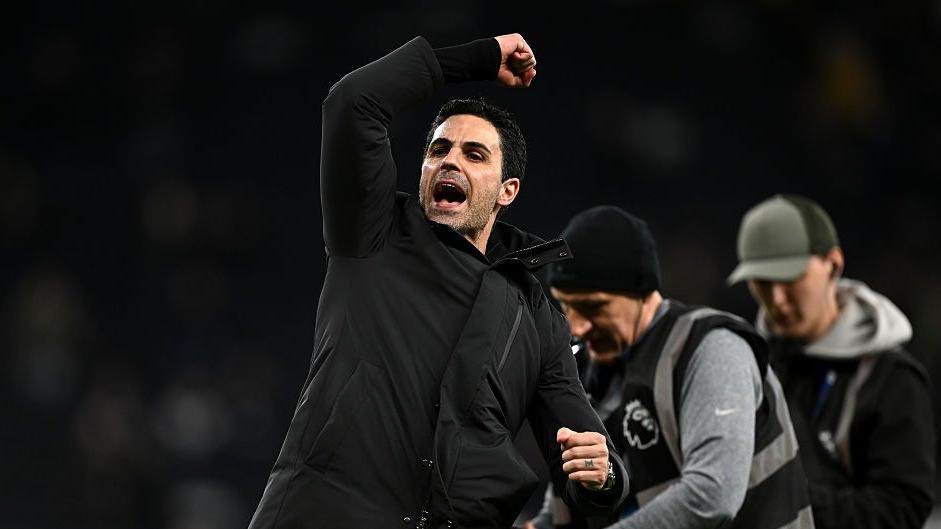 Jubilant Arsenal manager Mikel Arteta celebrates in front of their supporters after the north London derby win at Tottenham Hotspur.