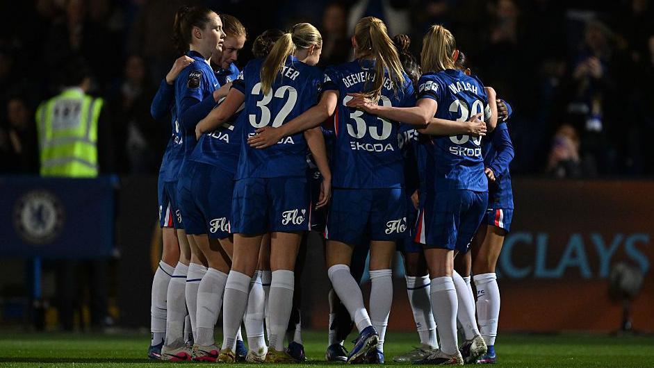 Alyssa Thompson of Chelsea celebrates with teammates