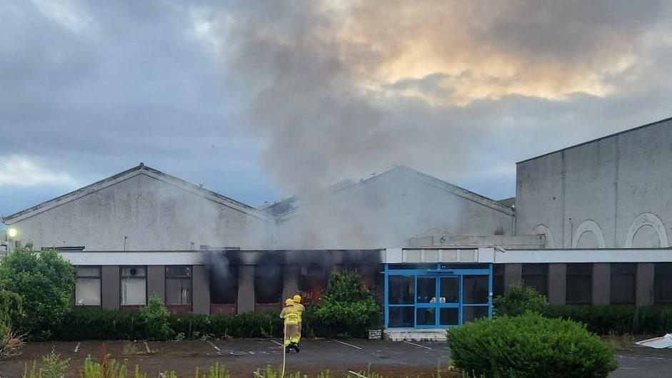 Firefighters putting out fire