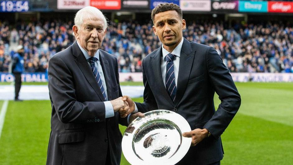 James Tavernier was presented with a commemorative shield by Rangers legend John Greig before what was supposed to be his farewell appearance
