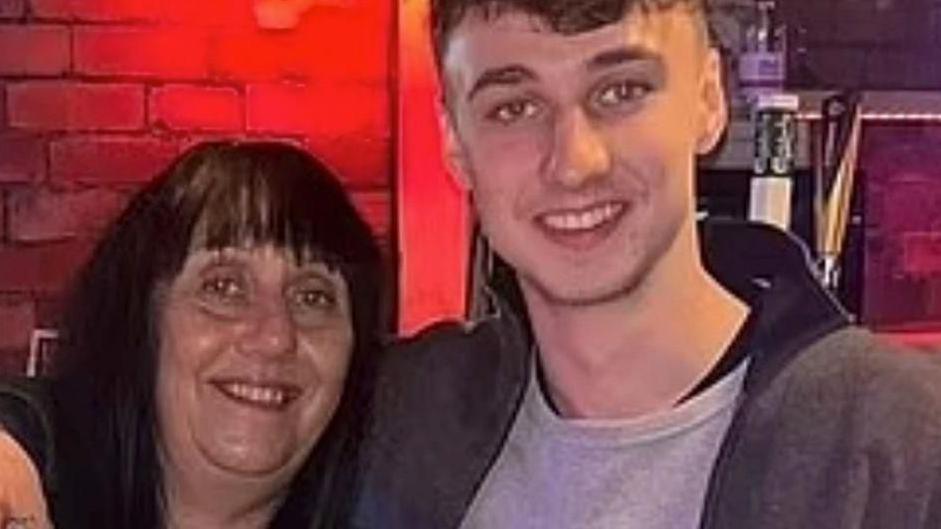 Jay Slater posing for a photo with his mum, Debbie Duncan