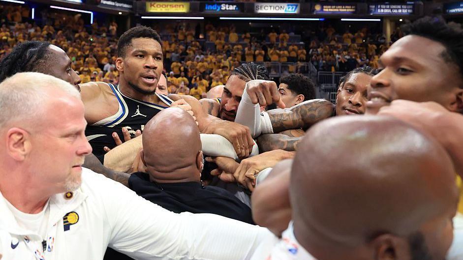 Giannis Antetokounmpo in a post-match altercation after his Milwaukee Bucks team were knocked out of the NBA play-offs by the Indiana Pacers