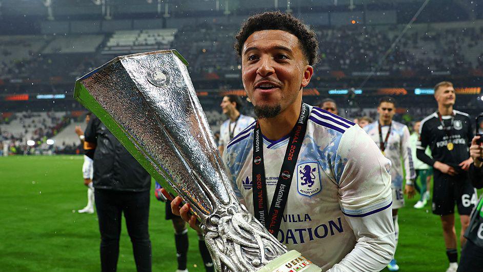 Jadon Sancho holds the Europa League trophy during the final celebrations after Aston Villa won the competition last season 