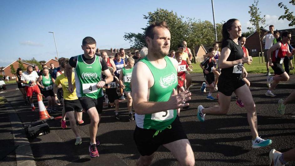 Runners taking part in 5k in Galliagh estate