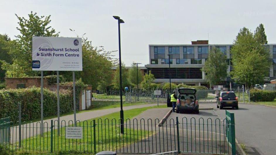 The outside of Swanshurst School