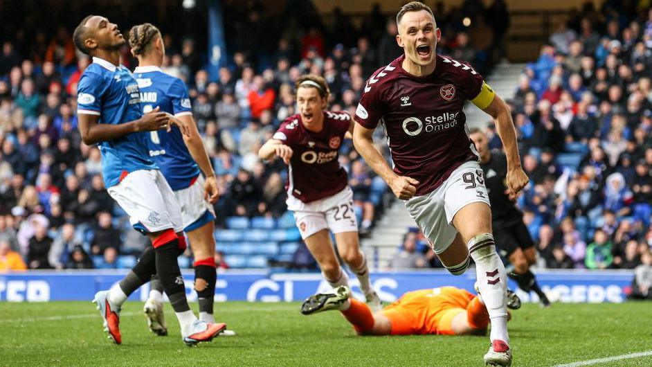 Lawrence Shankland celebrates at Ibrox