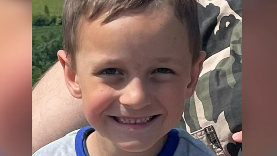 An image of five-year-old Timotej Borrett, smiling.