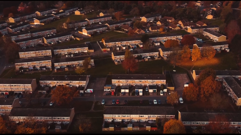 We can see the Abbey Estate from the air. There are several blocks of flats.