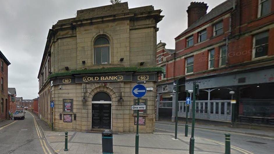 A stone-built pub in the town centre