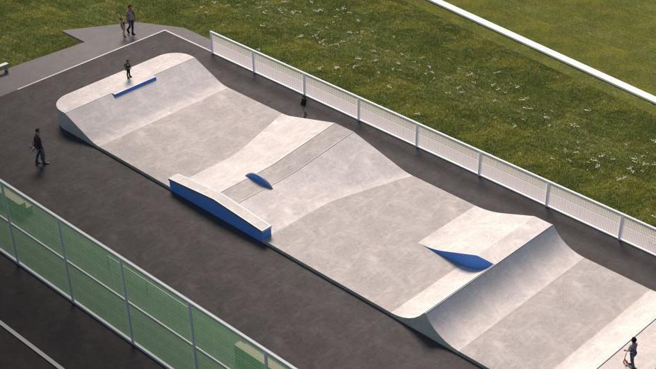 An image showing the planned design of a new skate park. It shows a long piece of grey concrete with ramps across it. It is surrounded by a white fence and grass 