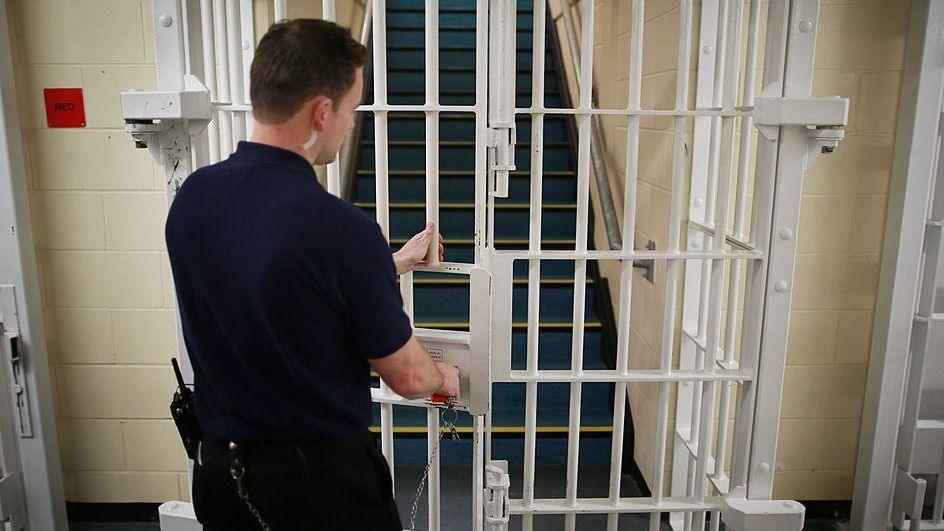 A door is closed by a prison guard at the Cookham Wood Young Offenders Institution (file photo)