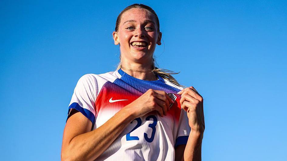 Layla Drury points to the England badge celebrating her goal