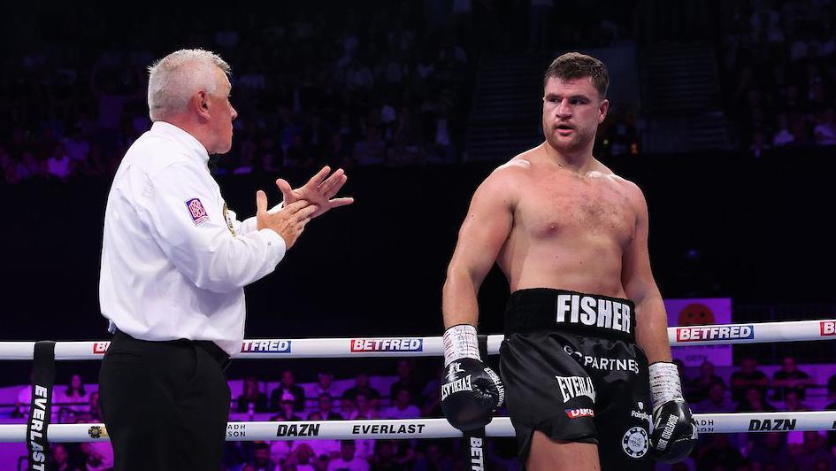 Johnny Fisher being given a count