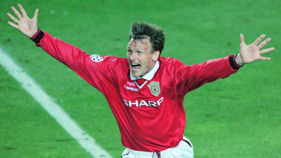 Teddy Sheringham celebrates scoring Manchester United's stoppage-time equaliser in the 1999 Champions League final