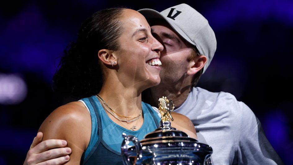 Bjorn Fratangelo kisses Madison Keys after her Australian Open victory