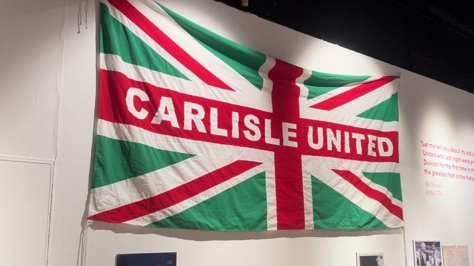 Carlisle United flag as a union flag but green red and white