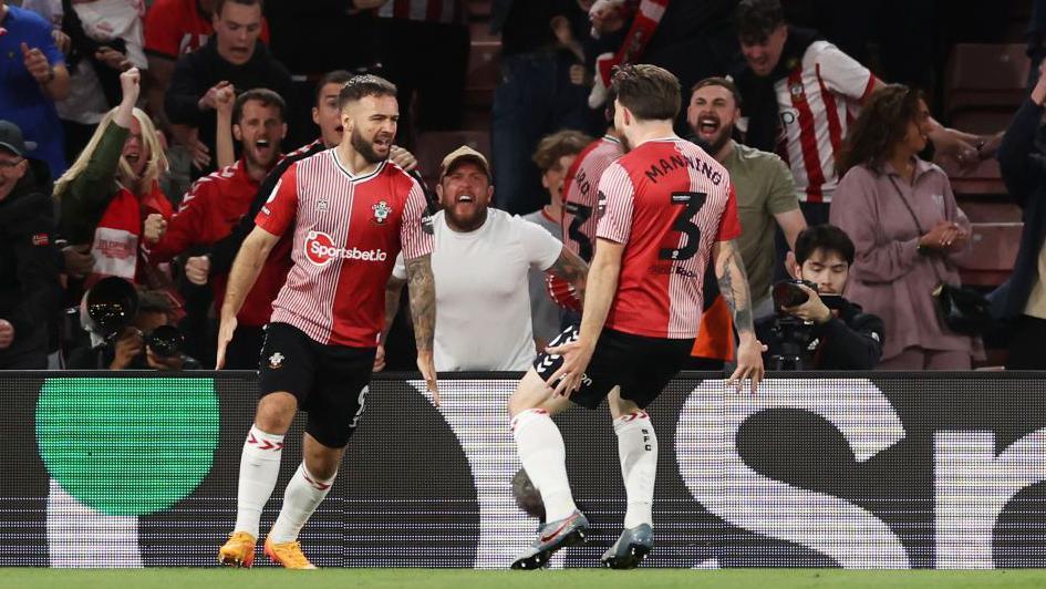 Adam Armstrong celebrates after scoring for Southampton